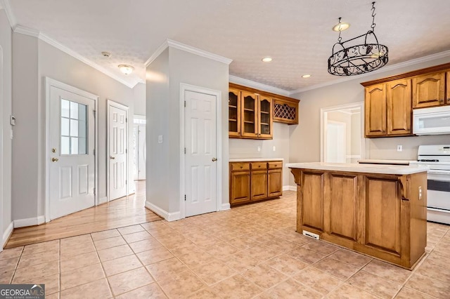 kitchen featuring light countertops, white appliances, brown cabinetry, and crown molding