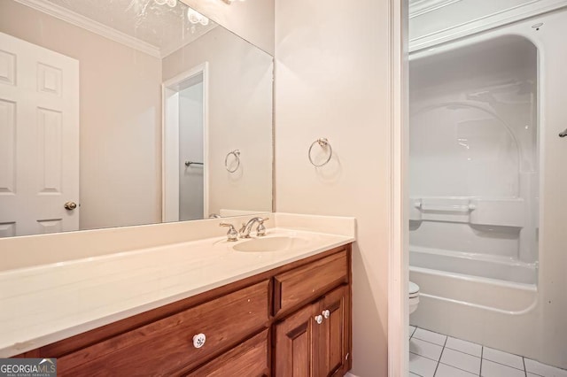 bathroom with tile patterned floors, vanity, toilet, and crown molding