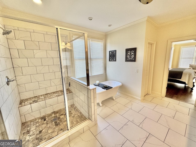 full bath with marble finish floor, a shower stall, and crown molding