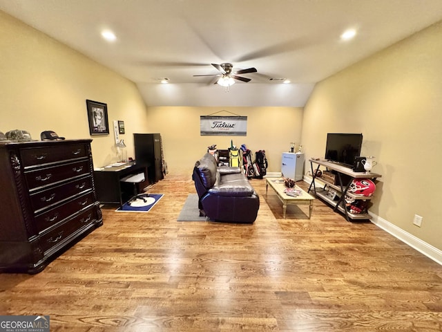 living room with baseboards, a ceiling fan, lofted ceiling, wood finished floors, and recessed lighting