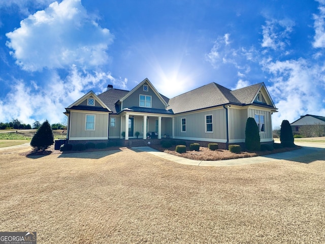 view of front facade featuring a shingled roof