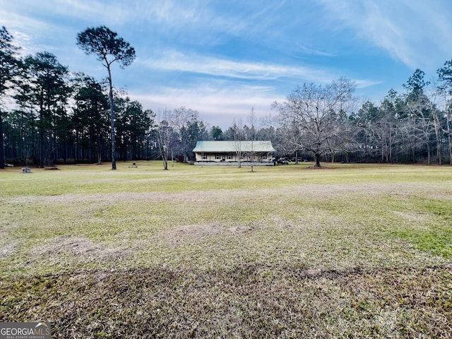 view of yard with a carport