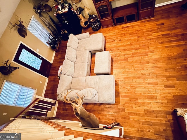 unfurnished living room with wood finished floors