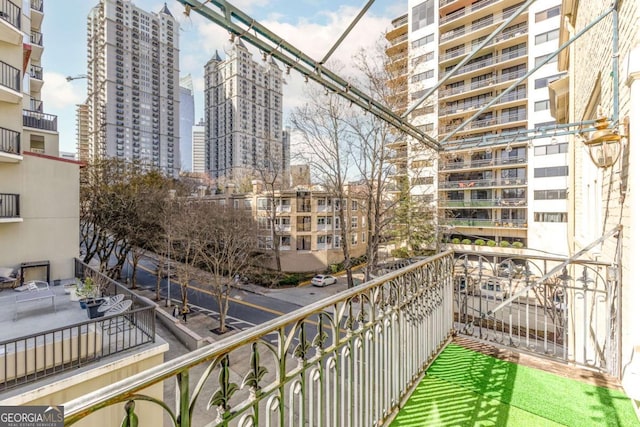 balcony featuring a view of city