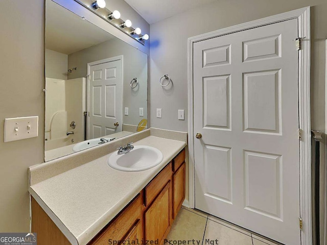 full bathroom with shower / bathtub combination, tile patterned flooring, and vanity