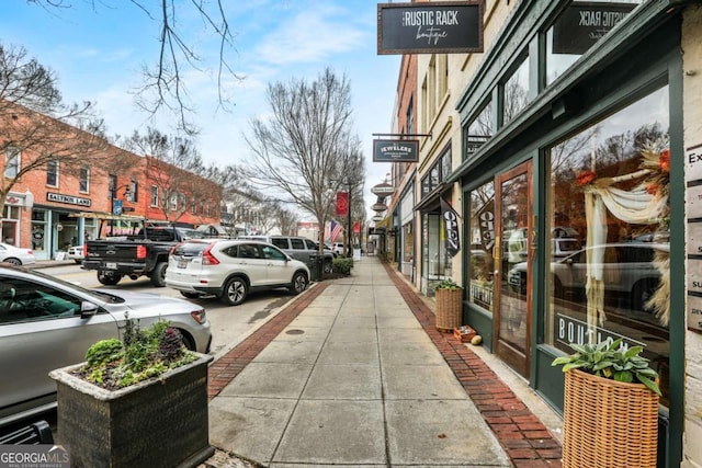 view of road featuring sidewalks