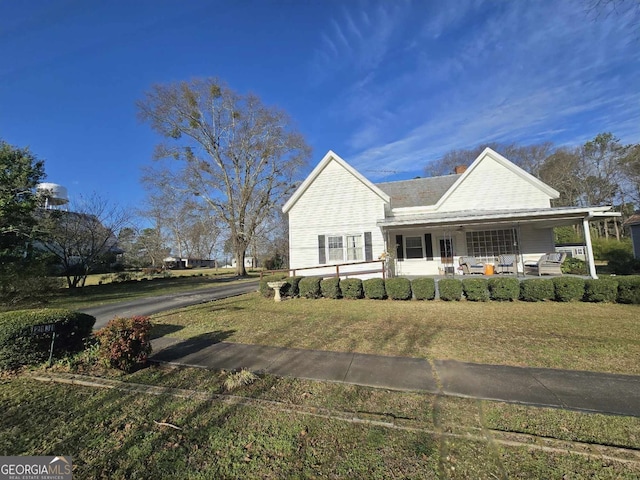 view of front facade with a porch and a front yard