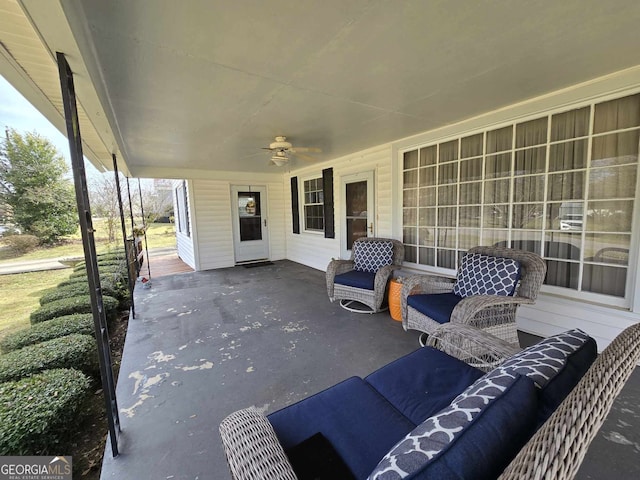 view of patio / terrace featuring ceiling fan