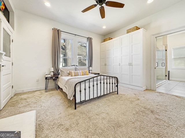 bedroom featuring baseboards, ensuite bath, ceiling fan, carpet flooring, and recessed lighting