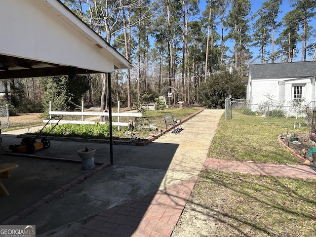 view of yard with fence