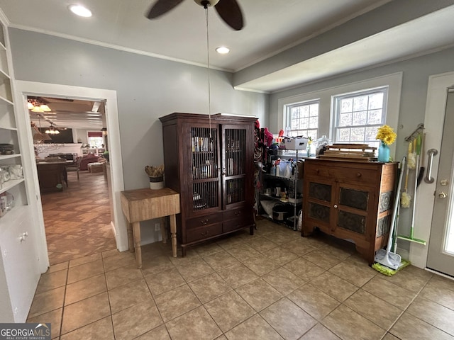 interior space featuring recessed lighting, ornamental molding, a ceiling fan, and tile patterned flooring