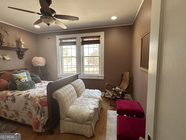 bedroom featuring ceiling fan, wood finished floors, ornamental molding, and recessed lighting