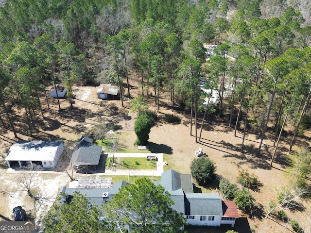 aerial view with a wooded view