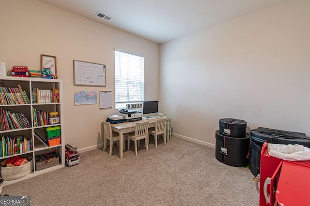 office featuring carpet floors, visible vents, and baseboards