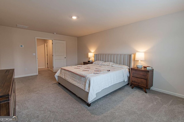 bedroom featuring carpet floors and baseboards