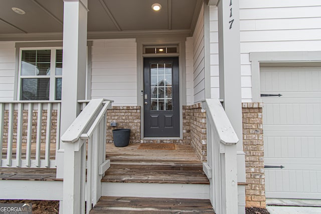 property entrance featuring covered porch