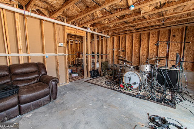 miscellaneous room with concrete floors