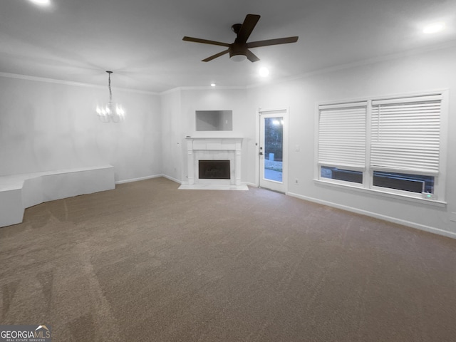 unfurnished living room with a fireplace with flush hearth, carpet flooring, crown molding, and baseboards