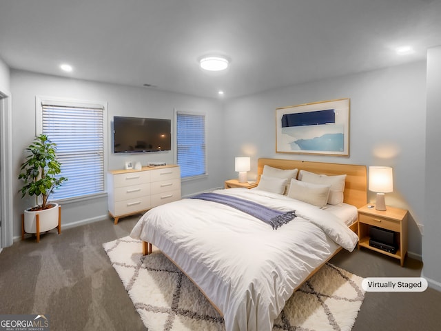 carpeted bedroom featuring recessed lighting and baseboards