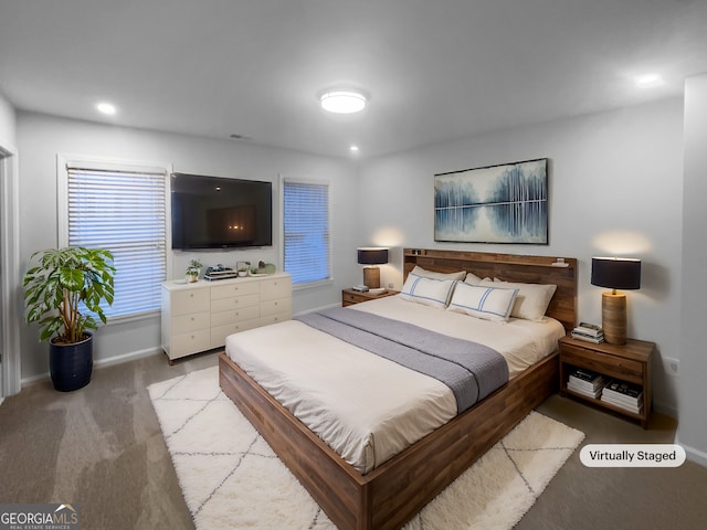 bedroom featuring recessed lighting, baseboards, and carpet flooring