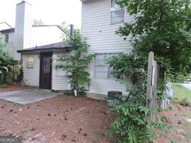 rear view of house with a patio