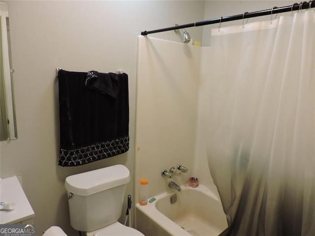 full bathroom with toilet, shower / tub combo with curtain, and vanity