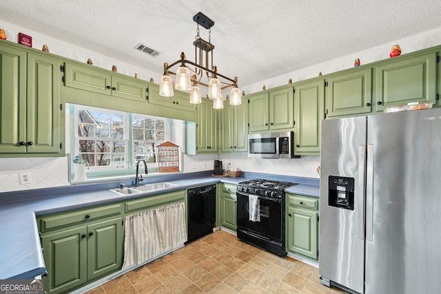 kitchen featuring tasteful backsplash, visible vents, black appliances, and a sink