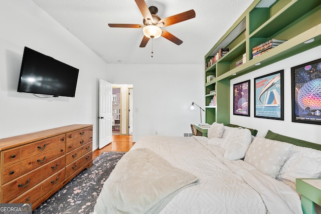 bedroom with wood finished floors