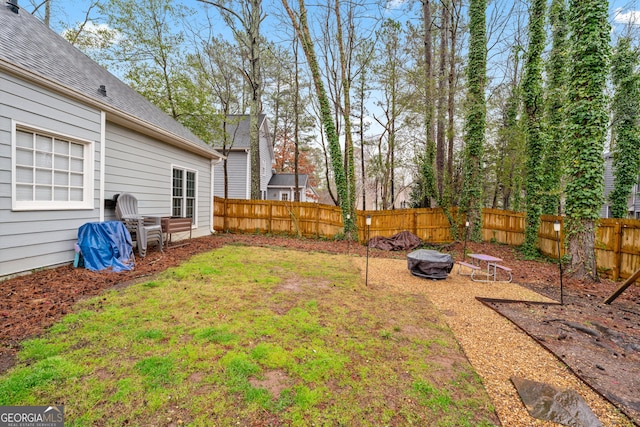 view of yard with fence