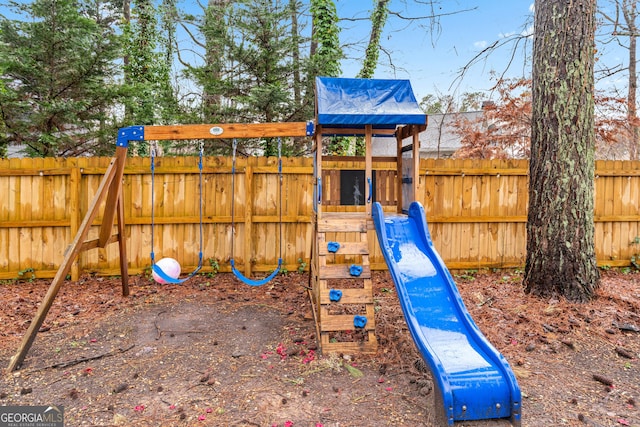 view of playground with fence