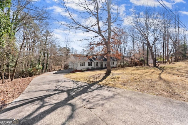 view of front of home featuring concrete driveway