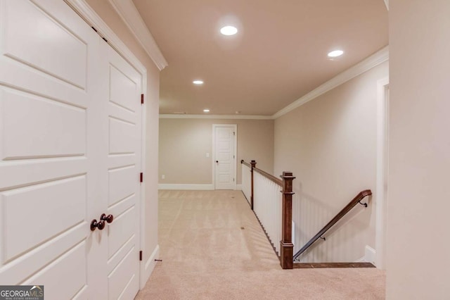 hall featuring light carpet, baseboards, ornamental molding, an upstairs landing, and recessed lighting