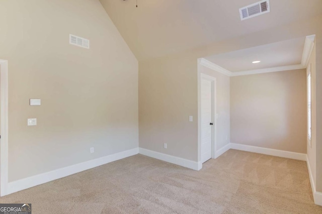 unfurnished room featuring baseboards, visible vents, and carpet flooring