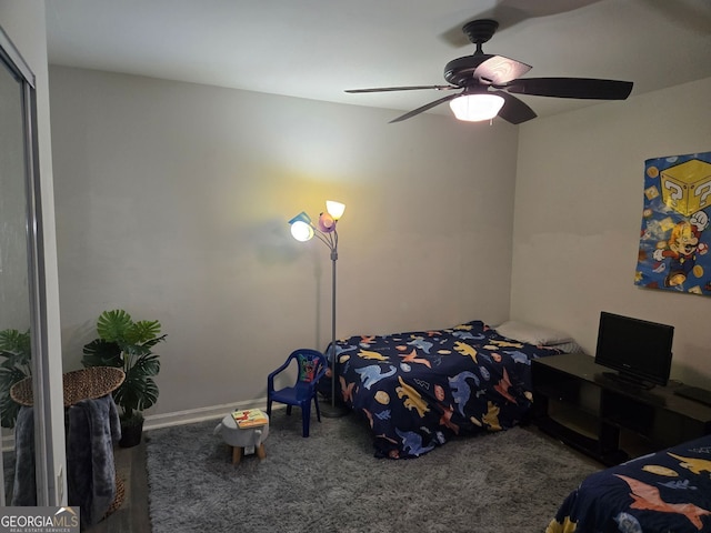 2077 Brockett Rd, Tucker, GA 30084 - bedroom featuring a closet, a ceiling fan, and baseboards