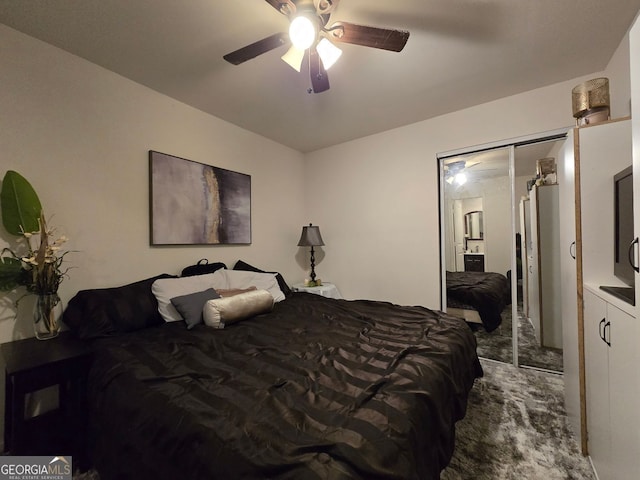 2077 Brockett Rd, Tucker, GA 30084 - bedroom featuring carpet flooring, ceiling fan, and a closet