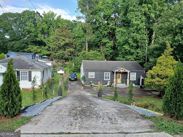 2077 Brockett Rd, Tucker, GA 30084 - view of front facade featuring asphalt driveway