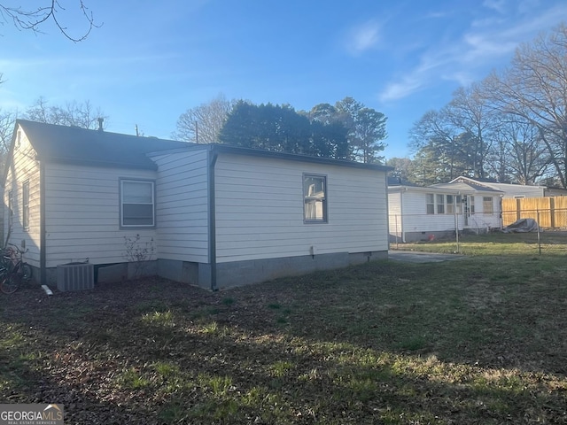 2077 Brockett Rd, Tucker, GA 30084 - view of side of home featuring central air condition unit and crawl space
