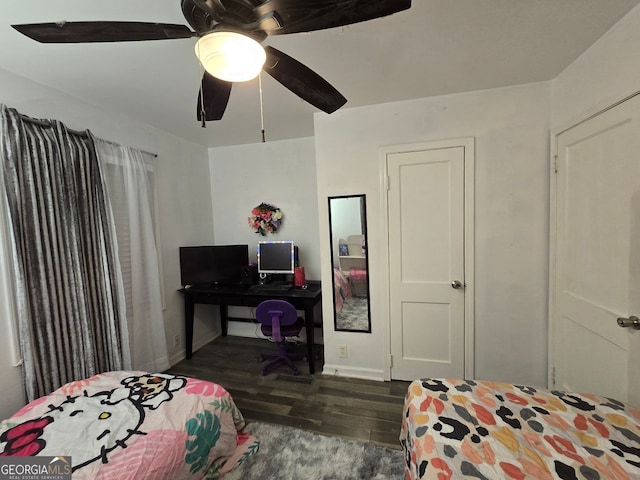 2077 Brockett Rd, Tucker, GA 30084 - bedroom featuring wood finished floors, baseboards, a desk, and a ceiling fan
