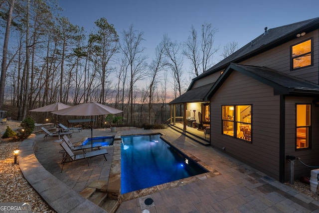 pool featuring a patio