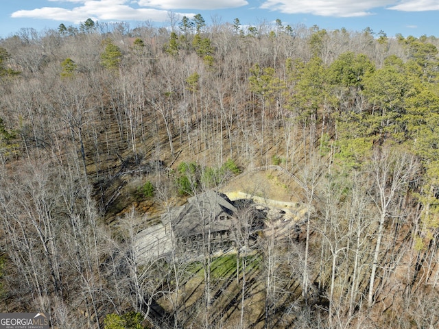 aerial view featuring a forest view