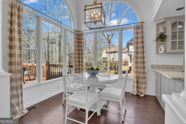 sunroom / solarium with visible vents