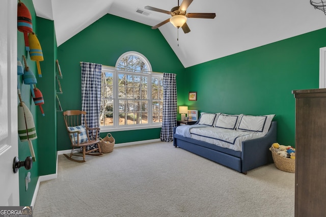 living area with a ceiling fan, baseboards, visible vents, carpet floors, and high vaulted ceiling