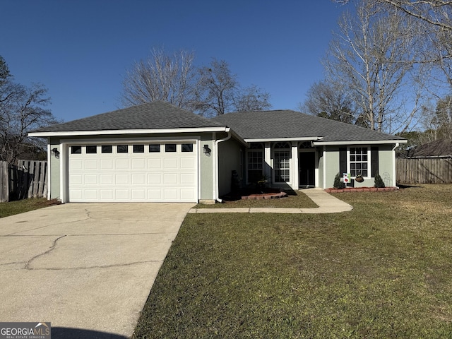 ranch-style house featuring fence, concrete driveway, roof with shingles, a front yard, and an attached garage