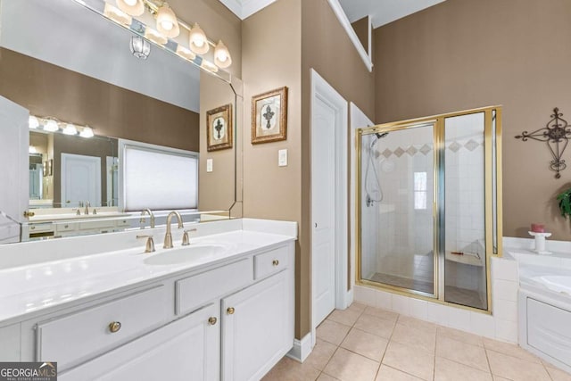 994 Fairview Club Cir, Dacula, GA 30019 - full bath featuring a bath, vanity, tile patterned floors, and a stall shower