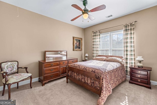 994 Fairview Club Cir, Dacula, GA 30019 - bedroom featuring visible vents, baseboards, and light carpet