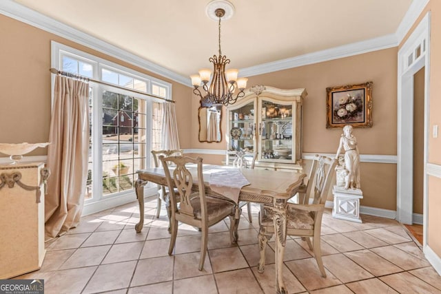 994 Fairview Club Cir, Dacula, GA 30019 - dining space featuring crown molding, a chandelier, and light tile patterned flooring