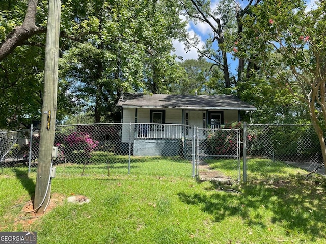 view of front of home with a fenced front yard, a gate, a porch, and a front lawn