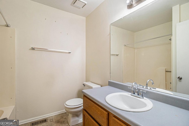 bathroom with visible vents, toilet, washtub / shower combination, baseboards, and vanity