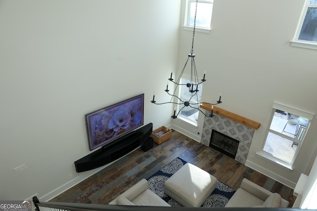 793 Round Tree Ct, Lawrenceville, GA 30045 - living area with a tiled fireplace, baseboards, and wood finished floors