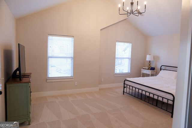793 Round Tree Ct, Lawrenceville, GA 30045 - bedroom featuring baseboards, light carpet, a notable chandelier, and high vaulted ceiling